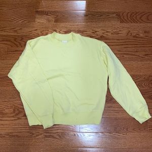 Soft yellow crew neck sweatshirt
